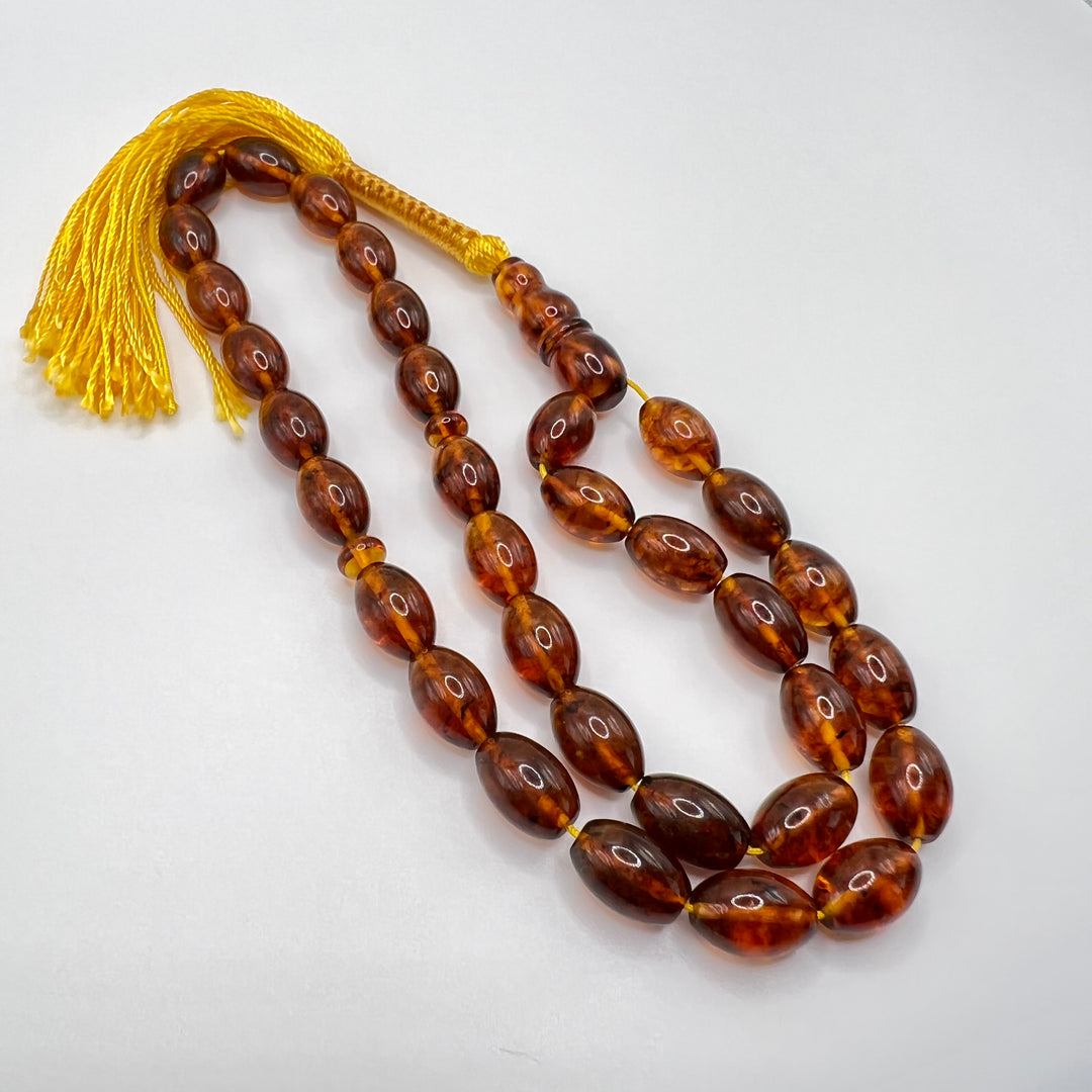 Oval Shape Cut Pressed Amber Baltic Tasbih Beads - Al Ali Gems