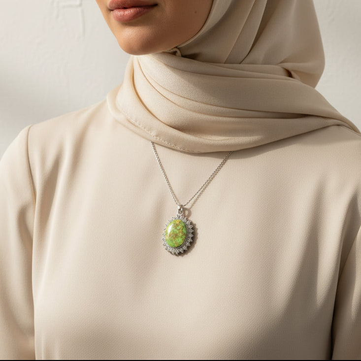Nabḍ Al Qimmah Turquoise (Feroza) Halo Sterling Silver Pendant